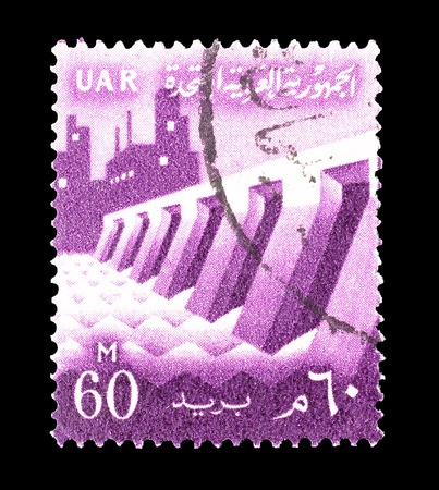 Cancelled postage stamp printed by Egypt, that shows Dam and factory, circa 1960.のeditorial素材
