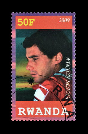 Cancelled postage stamp printed by Rwanda, that shows Ayrton Senna, circa 2009.のeditorial素材
