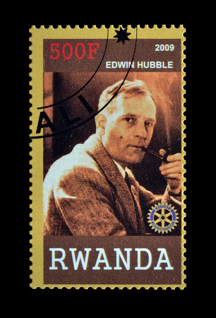 Cancelled postage stamp printed by Rwanda, that shows Edwin Hubble, circa 2009.