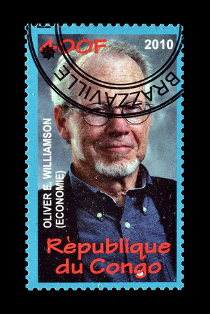 Cancelled postage stamp printed by Congo, that shows Oliver Williamson, circa 2010.のeditorial素材
