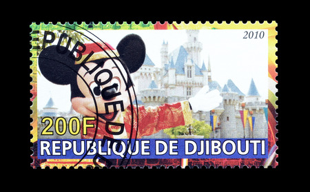 Cancelled postage stamp printed by Djibouti, that shows Disney world, circa 2010.のeditorial素材