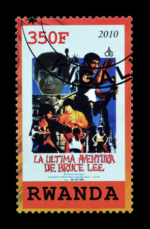 Cancelled postage stamp printed by Rwanda, that shows Bruce Lee circa 2010.のeditorial素材