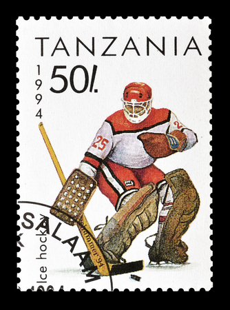 Cancelled postage stamp printed by Tanzania, that shows Ice hockey, circa 1994.のeditorial素材