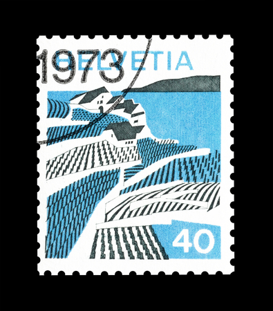 Cancelled postage stamp printed by Switzerland, that shows Riex, circa 1973.のeditorial素材