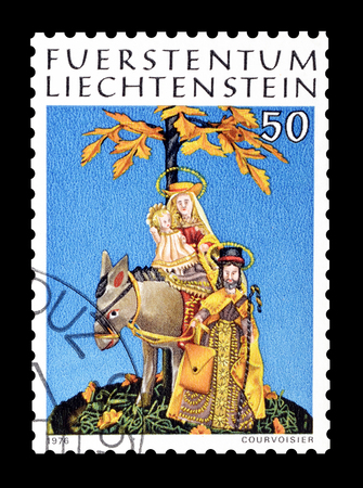 Cancelled postage stamp printed by Liechtenstein, that shows wax figures, circa 1976.のeditorial素材