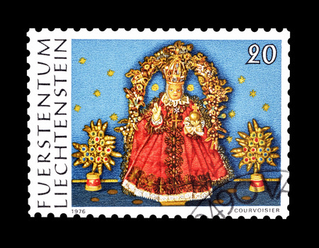 Cancelled postage stamp printed by Liechtenstein, that shows wax figure, circa 1976.のeditorial素材