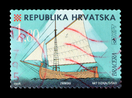 Cancelled postage stamp printed by Croatia, that shows ship Bracera, circa 1998.のeditorial素材
