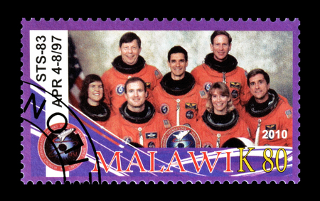 Cancelled postage stamp printed by Malawi, that shows astronauts, circa 2010.のeditorial素材