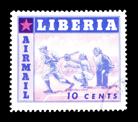 Cancelled postage stamp printed by Liberia, that shows baseball, circa 1955.のeditorial素材