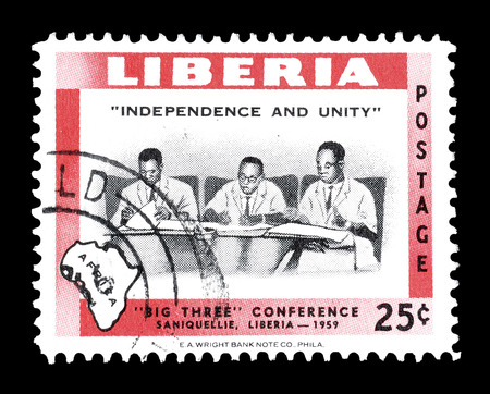 Cancelled postage stamp printed by Liberia, that shows big three conference, circa 1960.のeditorial素材