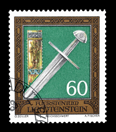 Cancelled postage stamp printed by Liechtenstein, that shows sward, circa 1975.のeditorial素材