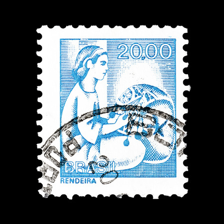 Cancelled postage stamp printed by Brasil, that shows Lacemaker, circa 1976.のeditorial素材