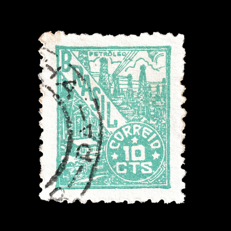 Cancelled postage stamp printed by Brasil, that shows Petroleum industry, circa 1947.のeditorial素材