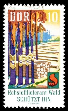 Cancelled postage stamp printed by German Democratic Republic, that shows forest, circa 1969.のeditorial素材