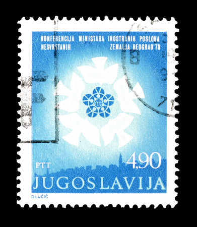 Cancelled postage stamp printed by Yugoslavia, that shows Non aligned Countries Conference logo, circa 1978.のeditorial素材
