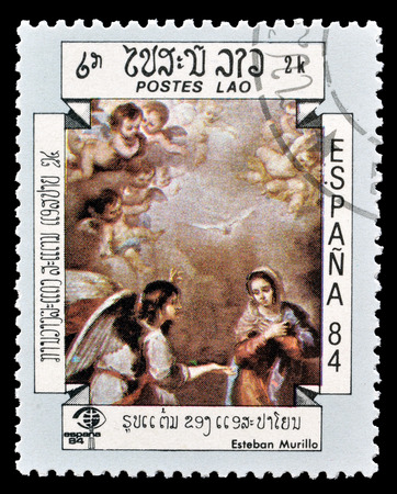 Cancelled postage stamp printed by Laos, that shows painting by Esteban Murillo, circa 1984.のeditorial素材