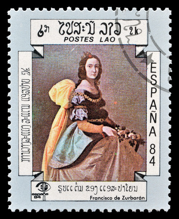 Cancelled postage stamp printed by Laos, that shows painting by Francisco Zurbaran, circa 1984.のeditorial素材