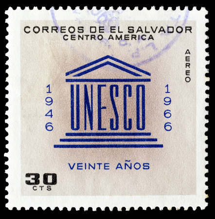 Cancelled postage stamp printed by El Salvador, that shows UNESCO emblem, circa 1966.のeditorial素材