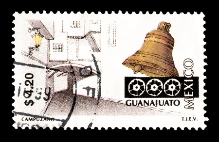 Cancelled postage stamp printed by Mexico, that shows Guanajuato Bell and Street, circa 1999.のeditorial素材
