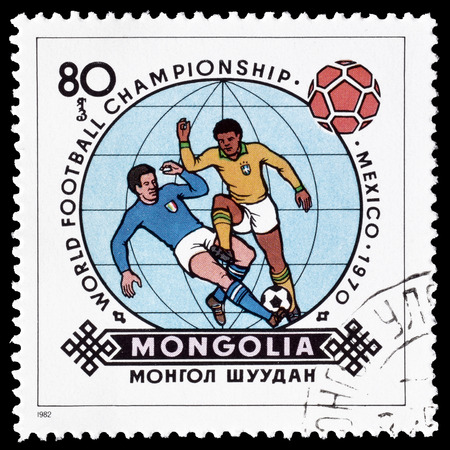 Cancelled postage stamp printed by Mongolia, that shows Football players, circa 1982.のeditorial素材