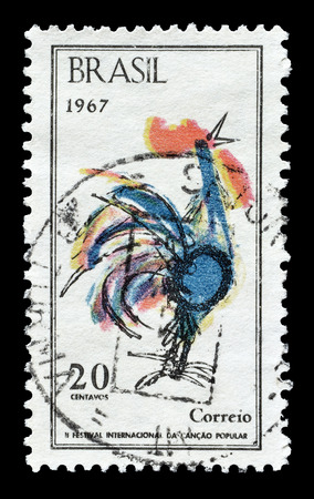 Cancelled postage stamp printed by Brazil, that shows Cockerel festival emblem, circa 1967.のeditorial素材