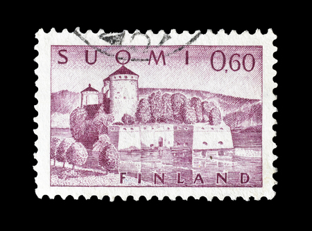 Cancelled postage stamp printed by Finland, that shows Olavinlinna fortress, circa 1963.のeditorial素材