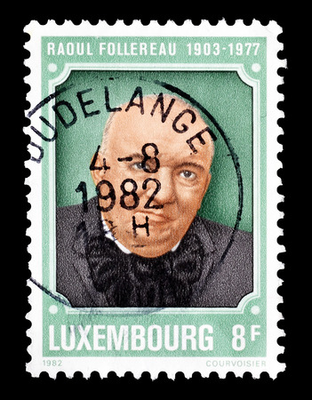 Cancelled postage stamp printed by Luxembourg, that shows Raoul Follereau, circa 1982.のeditorial素材
