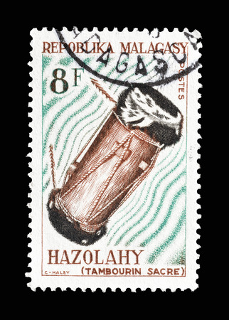 Cancelled postage stamp printed by Madagascar, that shows Hazolahy drum, circa 1965.のeditorial素材