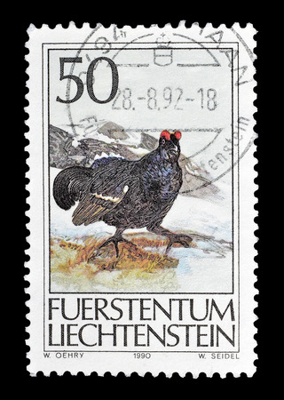 Cancelled postage stamp printed by Liechtenstein, that shows Black grouse, circa 1990.のeditorial素材