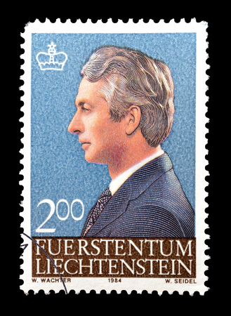 Cancelled postage stamp printed by Liechtenstein, that shows Prince Hans Adam, circa 1984.のeditorial素材