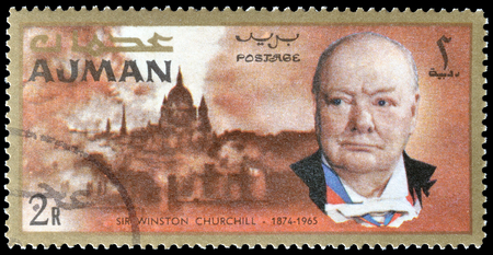 Cancelled postage stamp printed by Ajman, that shows Winston Churchill and London, circa 1966.のeditorial素材