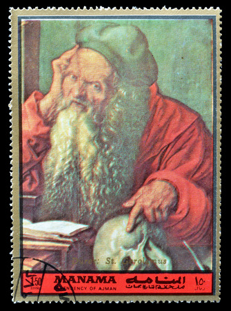 Cancelled postage stamp printed by Manama, that shows Saint Jerome, circa 1972.のeditorial素材