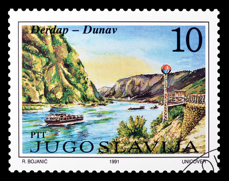 Cancelled postage stamp printed by Yugoslavia, that shows  Lighthouse Djerdap, circa 1991.のeditorial素材
