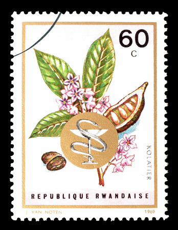 Cancelled postage stamp printed by Rwanda, that shows  Cola acuminata, circa 1969.のeditorial素材