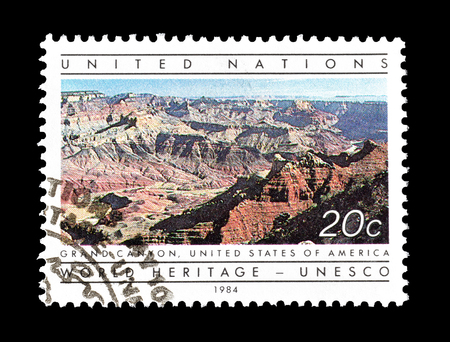 Cancelled postage stamp printed by United Nations, that promotes UNESCO world heritage, circa 1984.のeditorial素材