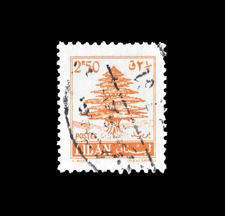 Cancelled postage stamp printed by Lebanon, that shows Cedar tree, circa 1961.のeditorial素材