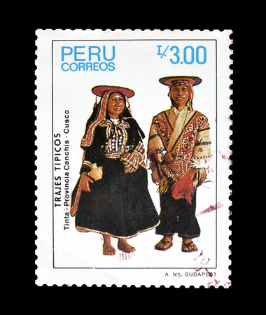 Cancelled postage stamp printed by Peru, that shows Costumes of Canchis province, circa 1986.のeditorial素材