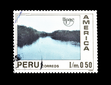 Cancelled postage stamp printed by Peru, that shows Mangrove swamp, circa 1991.のeditorial素材