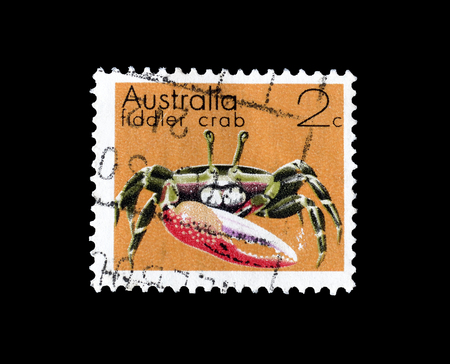 Cancelled postage stamp printed by Australia, that shows Fiddler crab, circa 1973.のeditorial素材