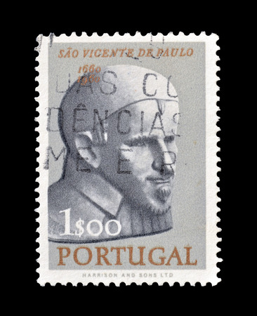 Cancelled postage stamp printed by Portugal, that shows Saint Vincent Van Paul, circa 1963.のeditorial素材