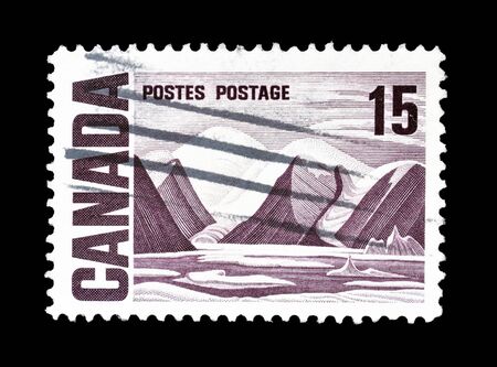 Cancelled postage stamp printed by Canada, that shows Bylot Island by Lawren Stewart Harris, circa 1969.のeditorial素材