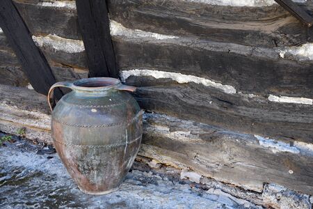Antique barrels and clay pots used for storing food and drink