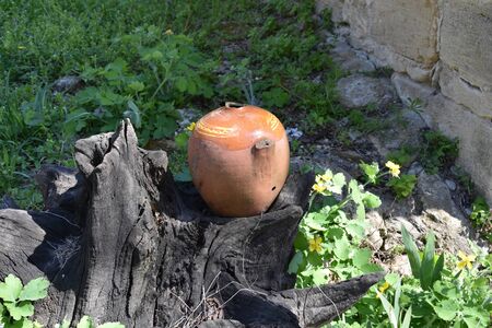 Antique barrels and clay pots used for storing food and drinkの写真素材