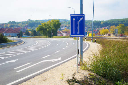 Road sign that shows drivers mandatory directions on road intersection