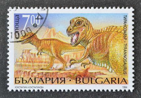 Cancelled postage stamp printed by Bulgaria, that shows Tyrannosaurus, circa 1994.のeditorial素材