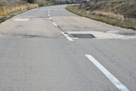 Damaged Motorway with different colored patches