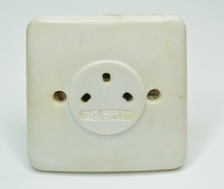 Vintage telephone socket isolated on gray background