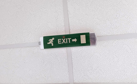 Exit security light on a wall of a buildingの写真素材