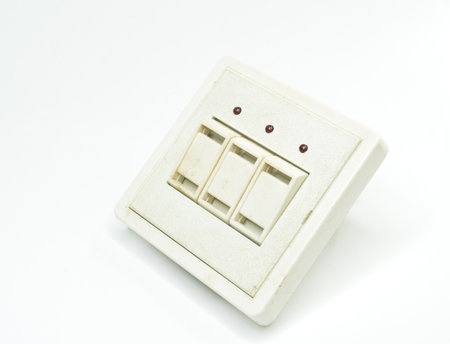 Vintage bathroom switch, light, heater and water heater on white backgroundの写真素材