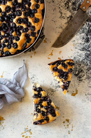focaccia with red grapes on a blue table. Italian Cuisine, the perfect appetizerの写真素材